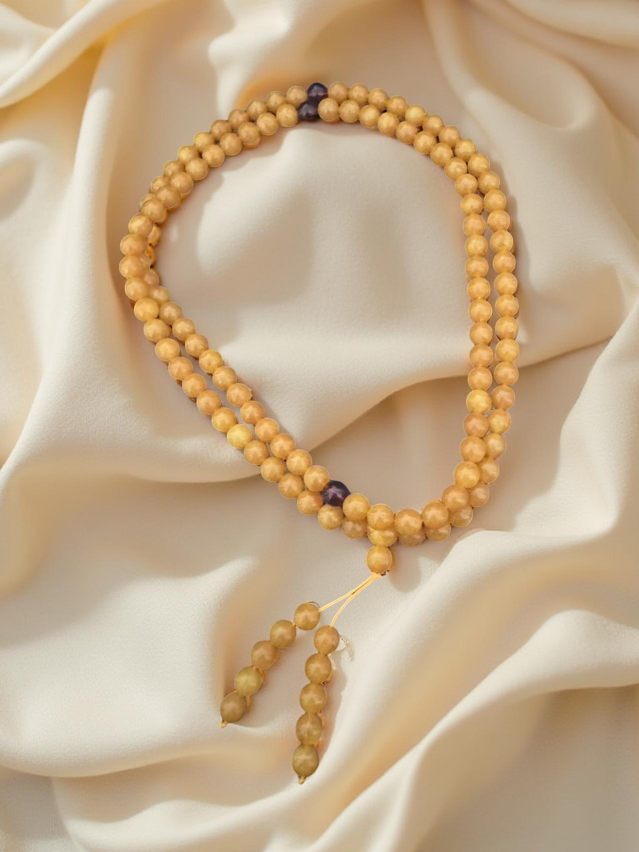 Mala aus Kunst-Bernstein im tibetischen Stil mit 108 Perlen, ideal für Meditation und Yoga.