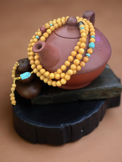 Mala-Halskette aus Bernstein & Türkis – Handgeschnitzt