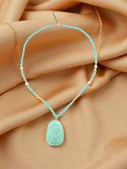 Tibetische Halskette aus geschnitztem Türkis