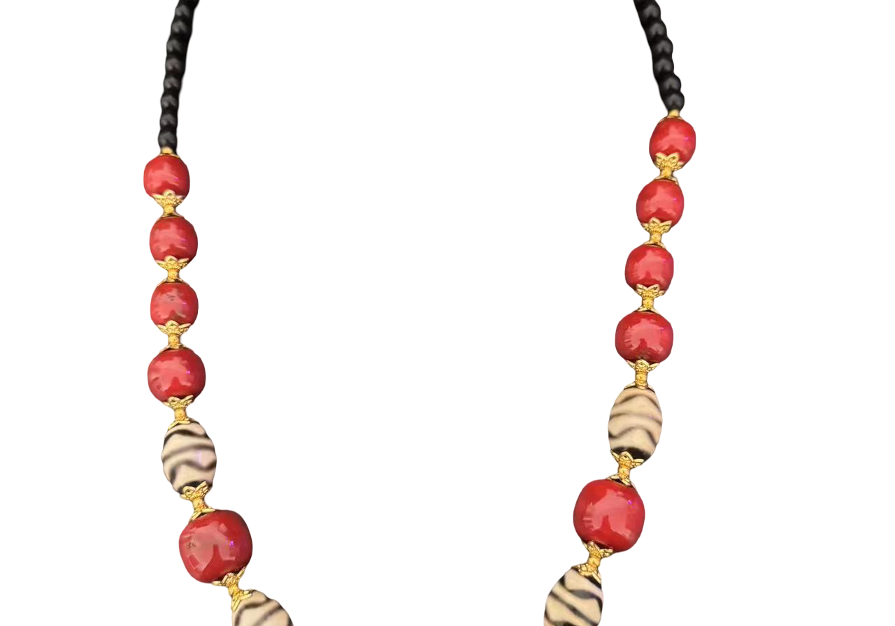 Tibetische Halskette mit Koralle – Handgefertigt & TraditionellDetails für Tibetische Halskette mit Dzi-Stein & Koralle – Handgefertigt ansehen Tibetische Halskette mit Dzi-Stein & Koralle